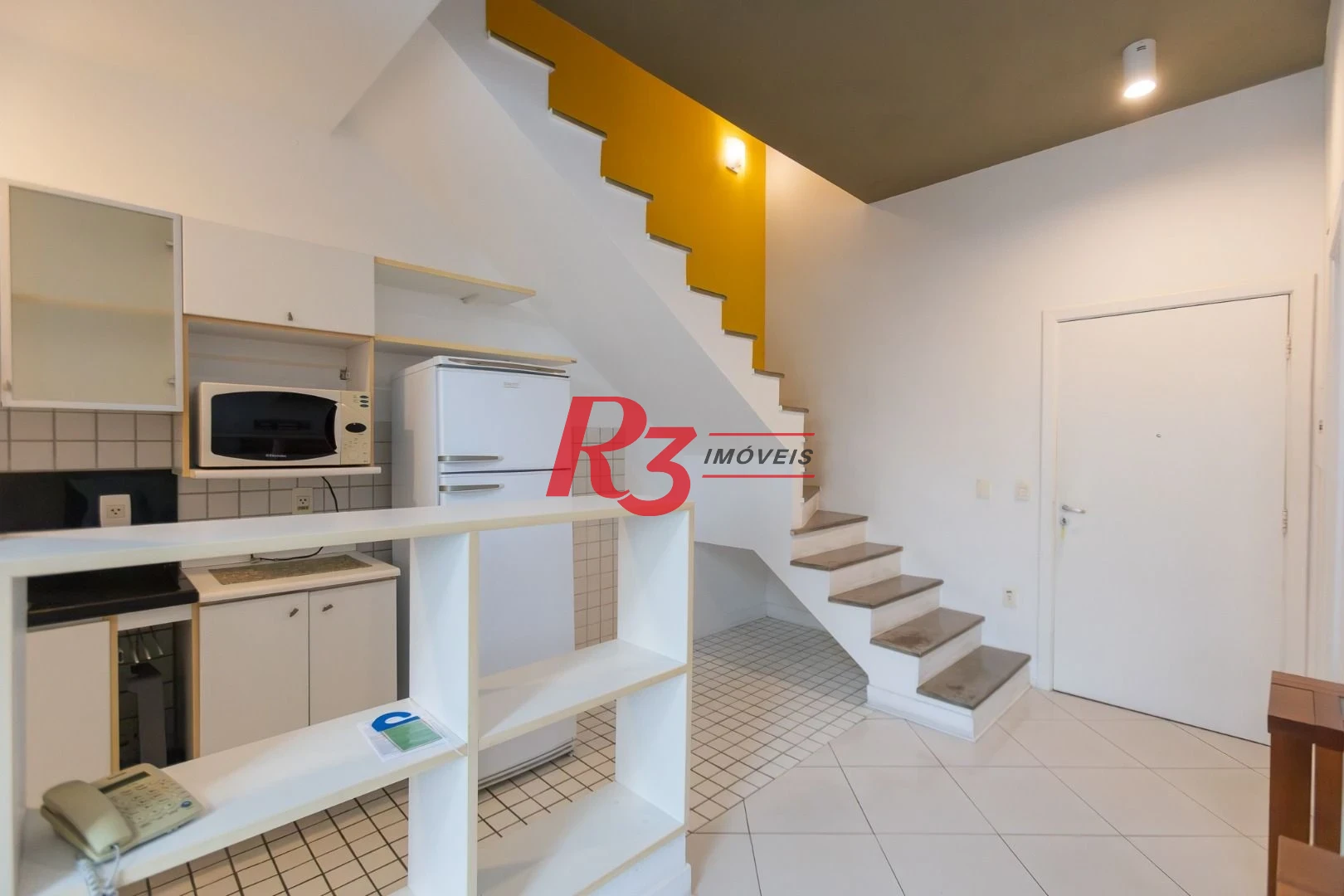 Apartamento Duplex com 2 dormitórios à venda, 80 m² por R$ 800.000,00 - Gonzaga - Santos/SP