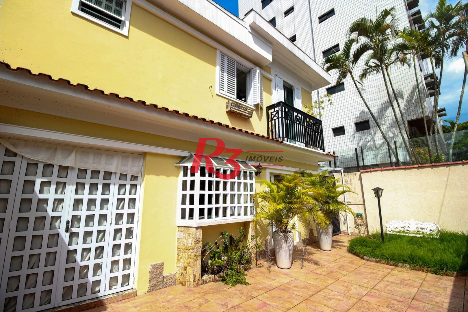 Sobrado com 3 dormitórios à venda, 200 m² por R$ 1.950.000,00 - Embaré - Santos/SP