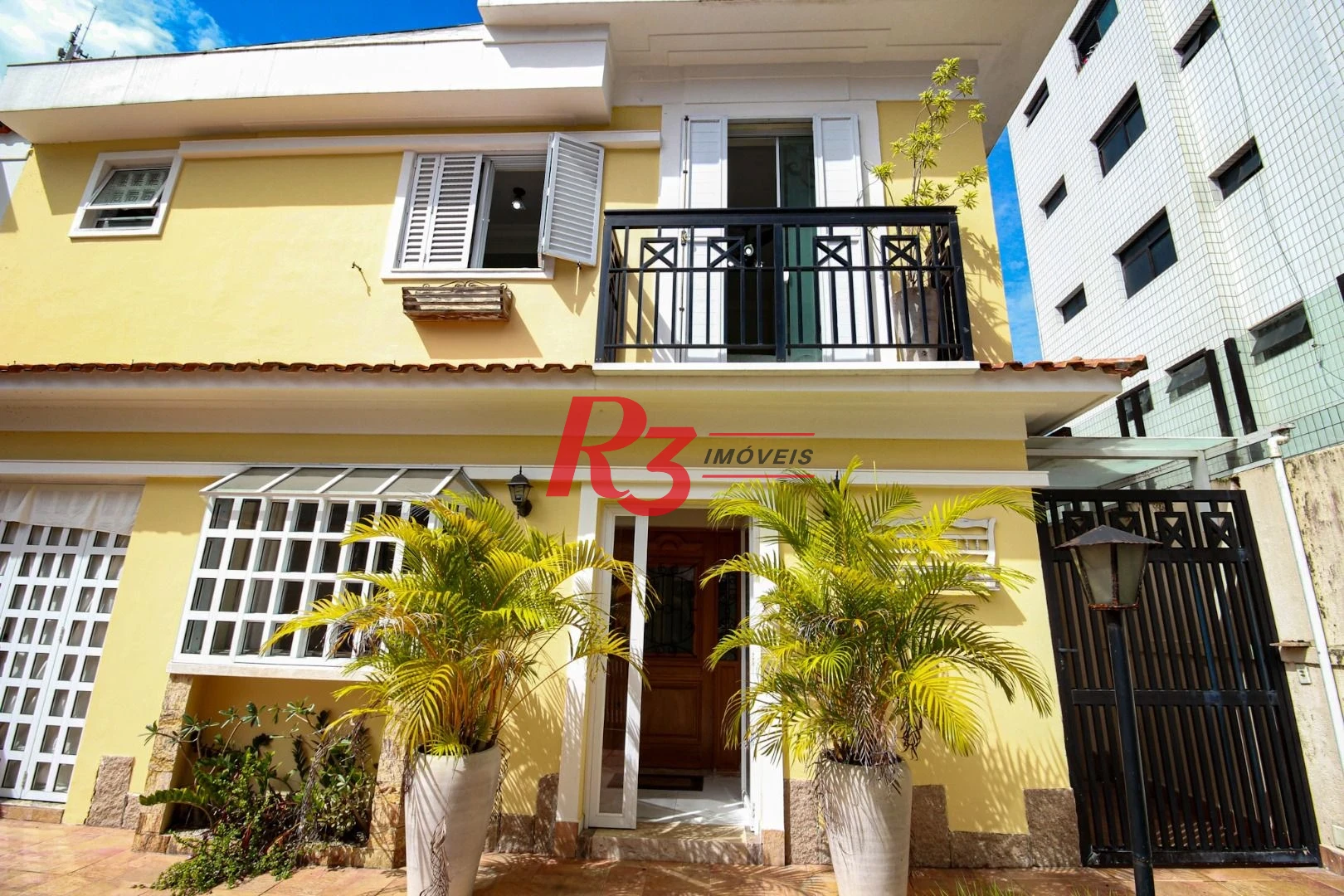 Sobrado com 3 dormitórios à venda, 200 m² por R$ 1.950.000,00 - Embaré - Santos/SP