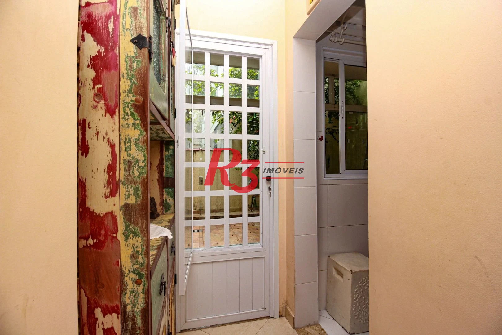 Sobrado com 3 dormitórios à venda, 200 m² por R$ 1.950.000,00 - Embaré - Santos/SP