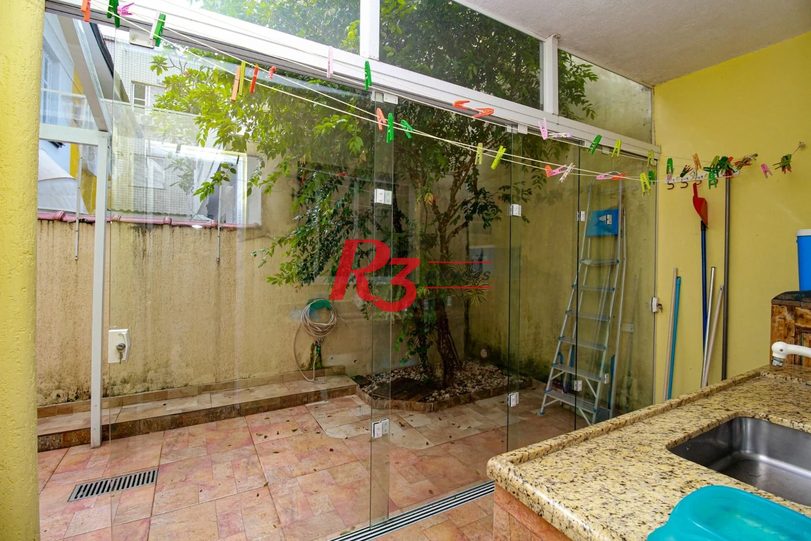 Sobrado com 3 dormitórios à venda, 200 m² por R$ 1.950.000,00 - Embaré - Santos/SP