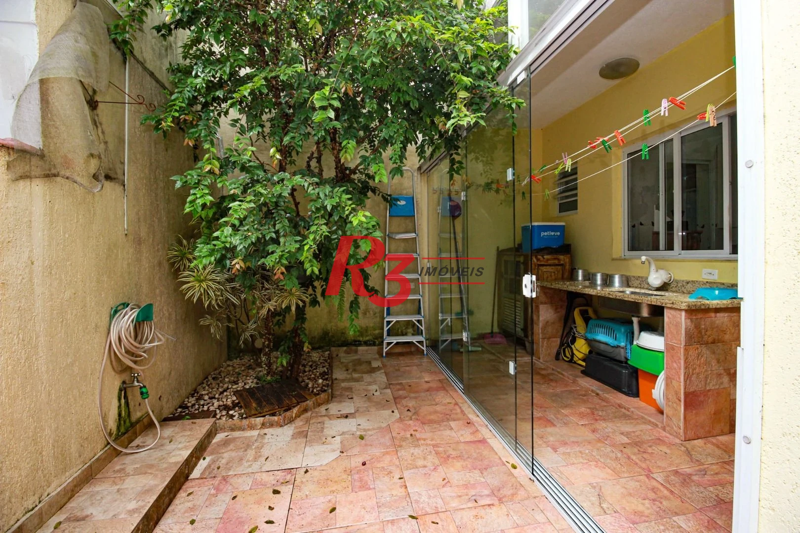 Sobrado com 3 dormitórios à venda, 200 m² por R$ 1.950.000,00 - Embaré - Santos/SP