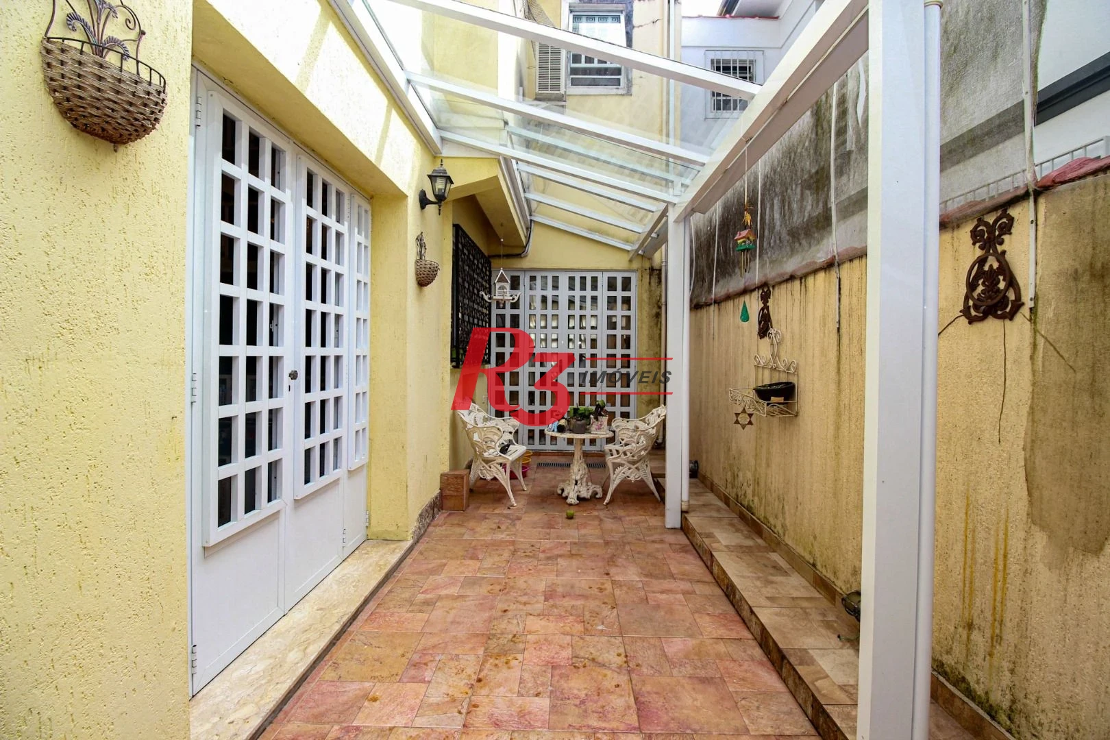 Sobrado com 3 dormitórios à venda, 200 m² por R$ 1.950.000,00 - Embaré - Santos/SP