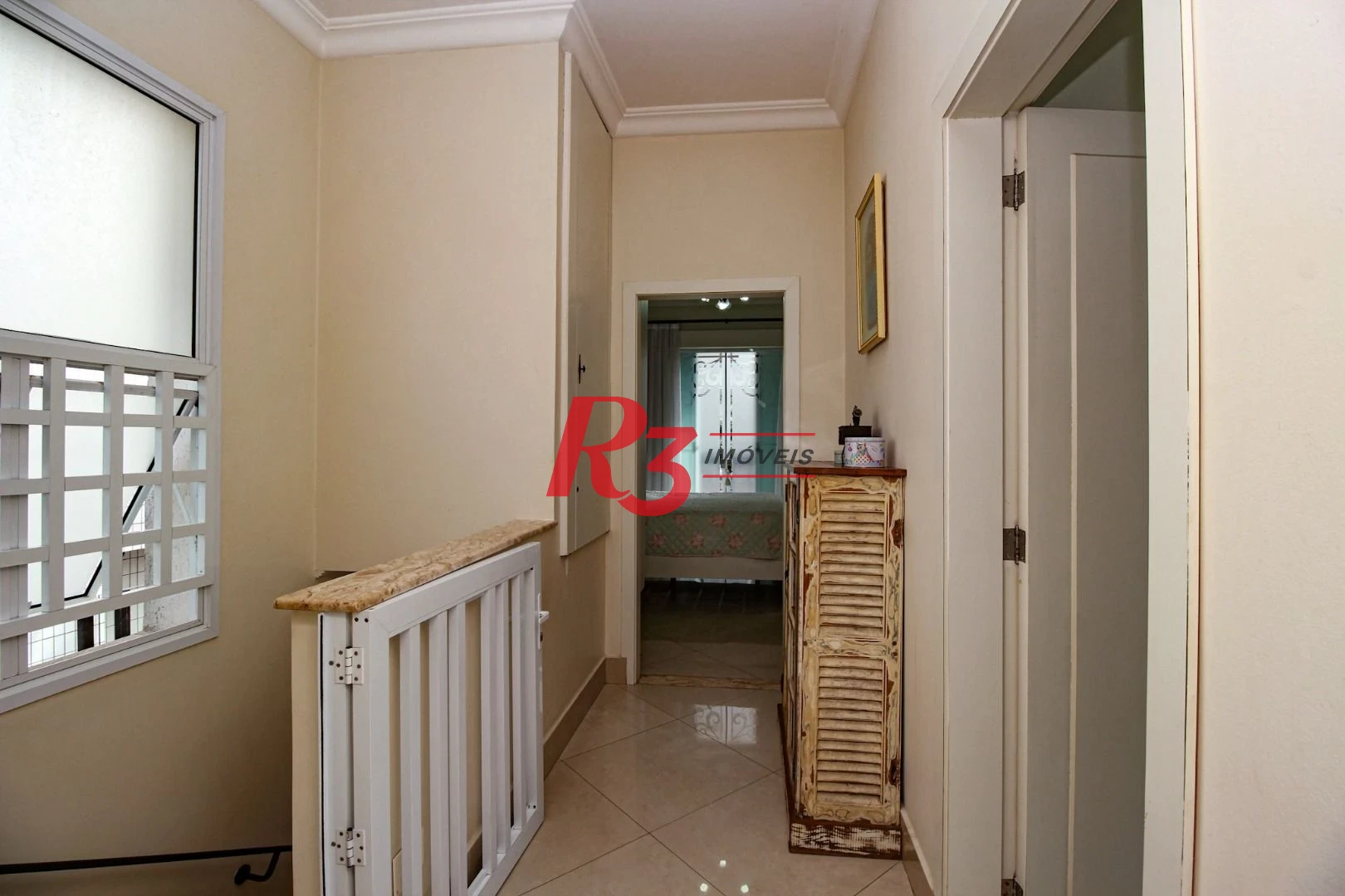 Sobrado com 3 dormitórios à venda, 200 m² por R$ 1.950.000,00 - Embaré - Santos/SP
