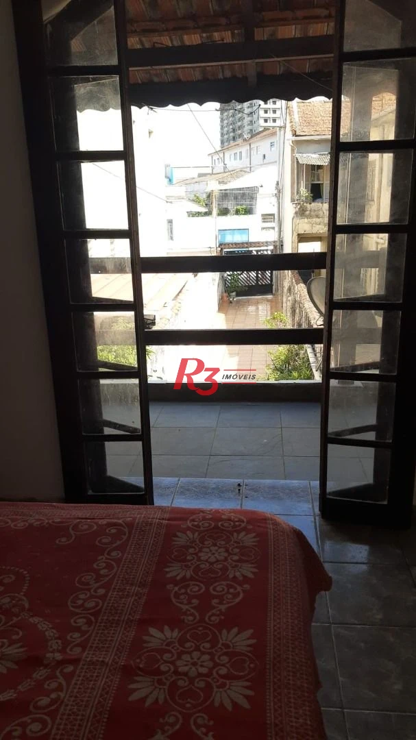 Sobrado com 3 dormitórios à venda, 119 m² por R$ 450.000 no Centro de São Vicente/SP