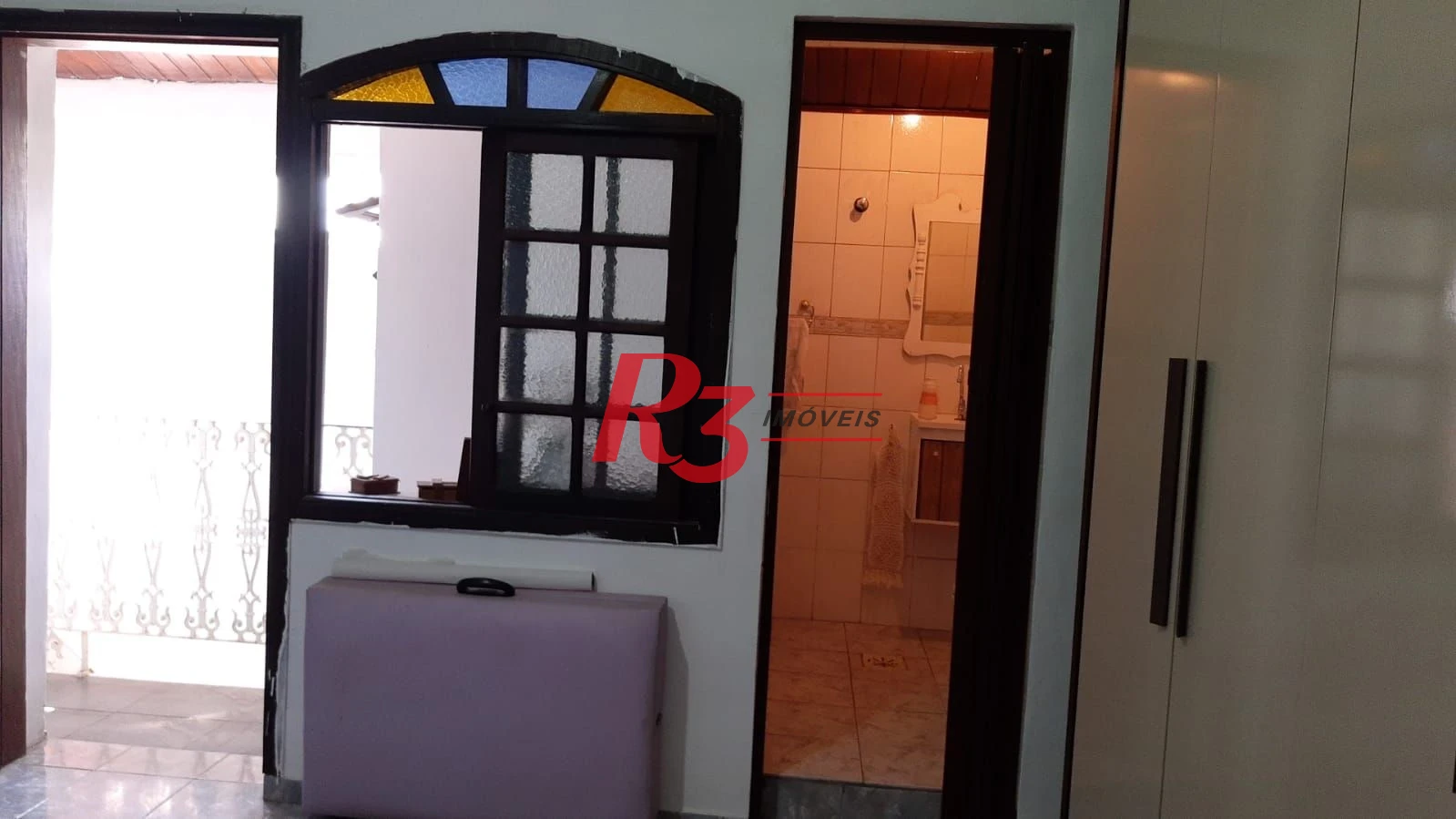 Sobrado com 3 dormitórios à venda, 119 m² por R$ 450.000 no Centro de São Vicente/SP