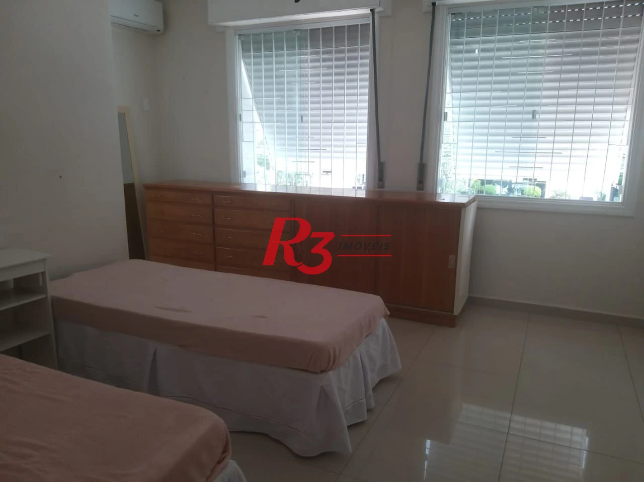 Sobrado com 4 dormitórios à venda, 180 m² por R$ 1.580.000,00 - Boqueirão - Santos/SP