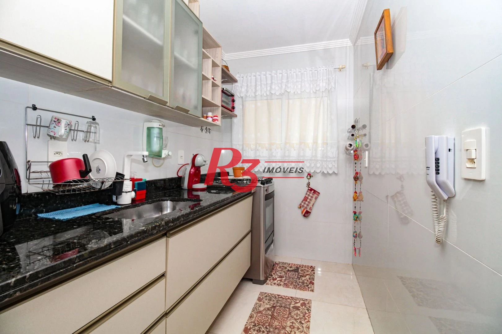 Casa com 2 dormitórios à venda, 100 m² por R$ 750.000,00 - Gonzaga - Santos/SP
