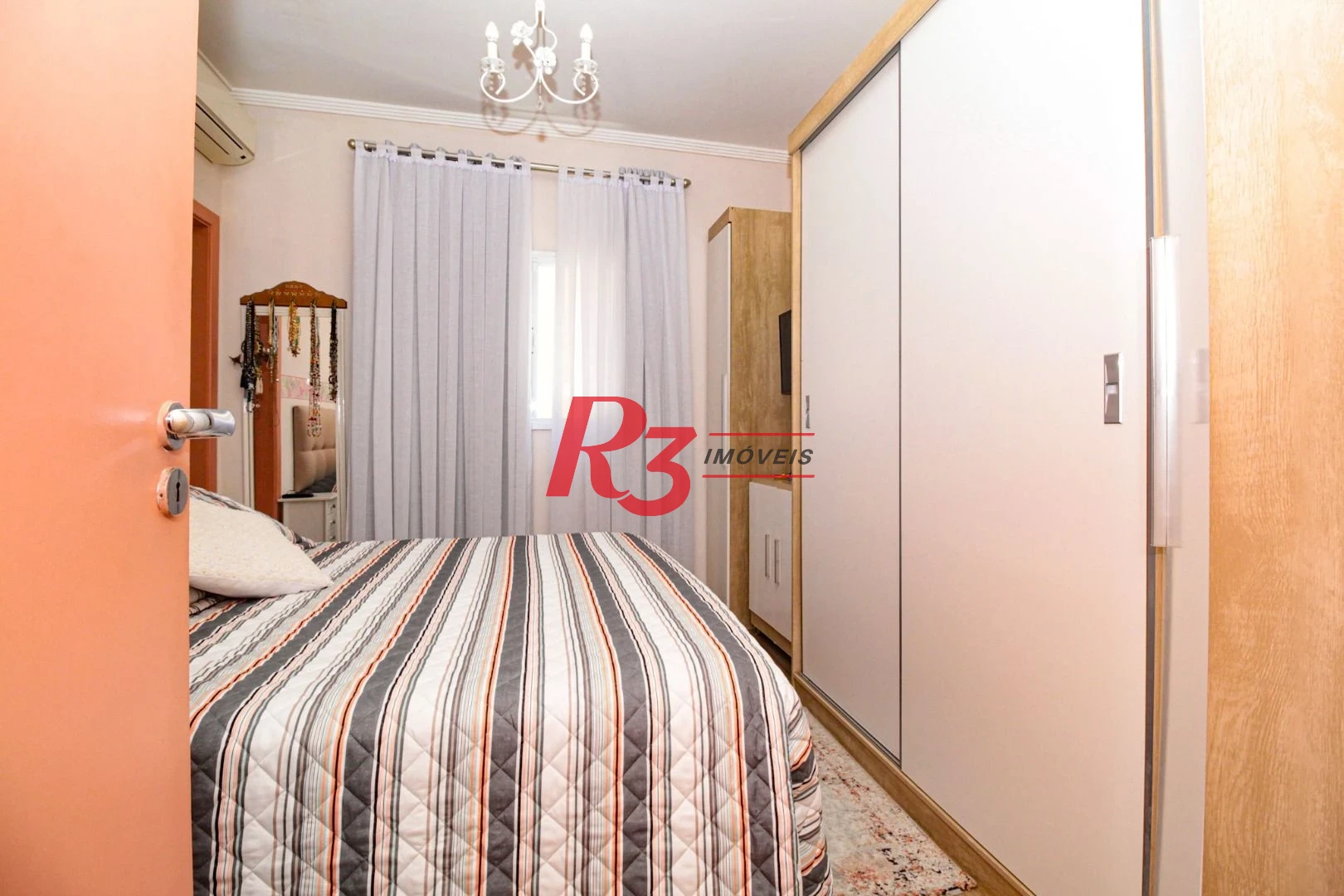 Casa com 2 dormitórios à venda, 100 m² por R$ 750.000,00 - Gonzaga - Santos/SP
