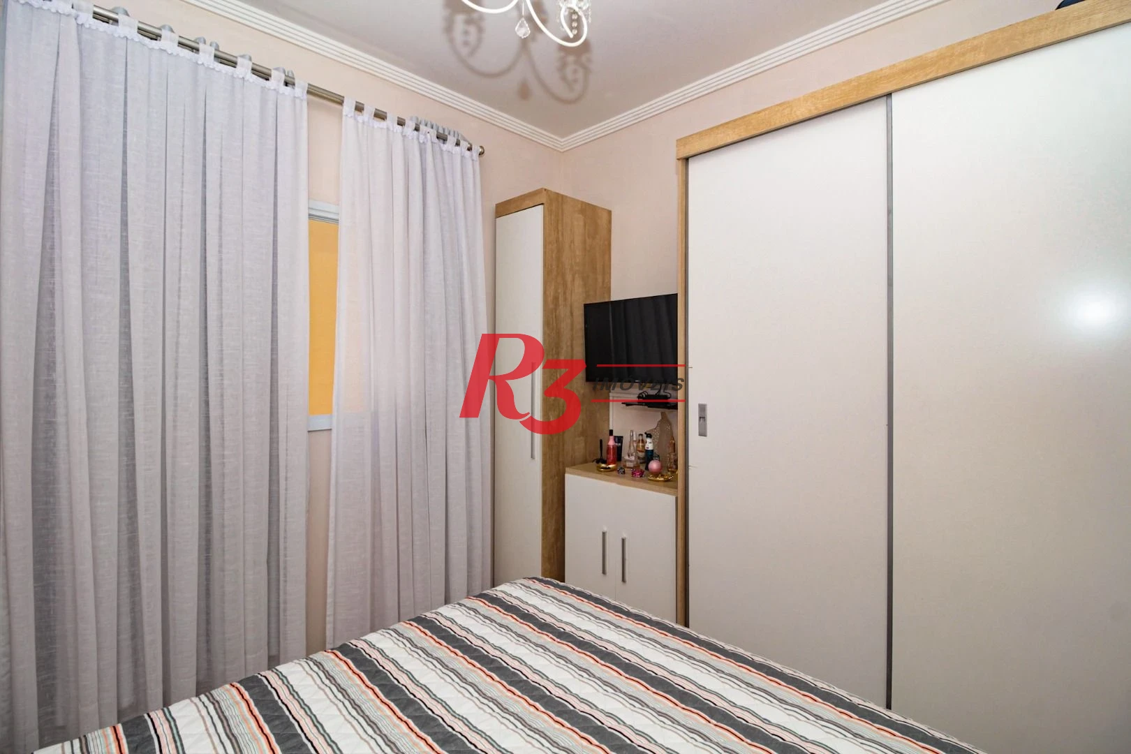 Casa com 2 dormitórios à venda, 100 m² por R$ 750.000,00 - Gonzaga - Santos/SP
