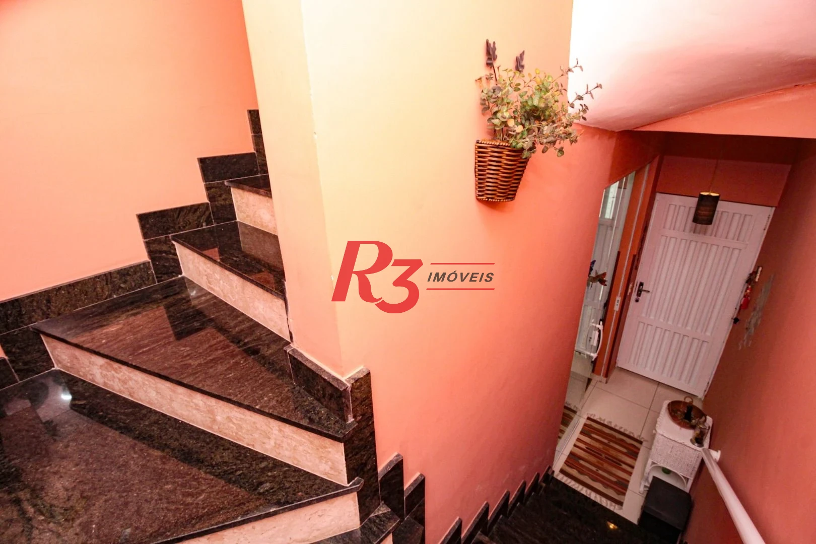 Casa com 2 dormitórios à venda, 100 m² por R$ 750.000,00 - Gonzaga - Santos/SP