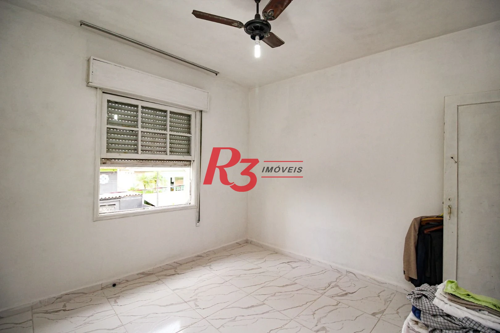 Apartamento com 2 dormitórios à venda, 76 m² por R$ 450.000,00 - Embaré - Santos/SP