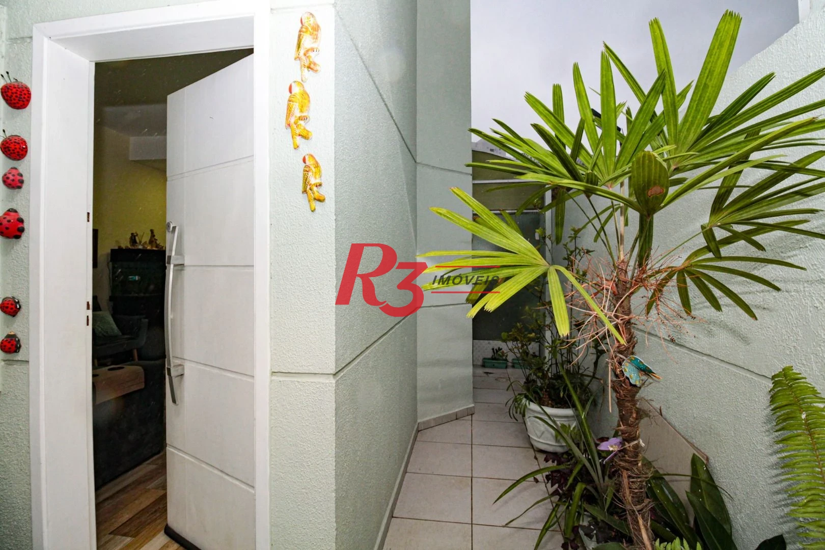 Sobrado com 3 dormitórios à venda, 89 m² por R$ 790.000,00 - Campo Grande - Santos/SP