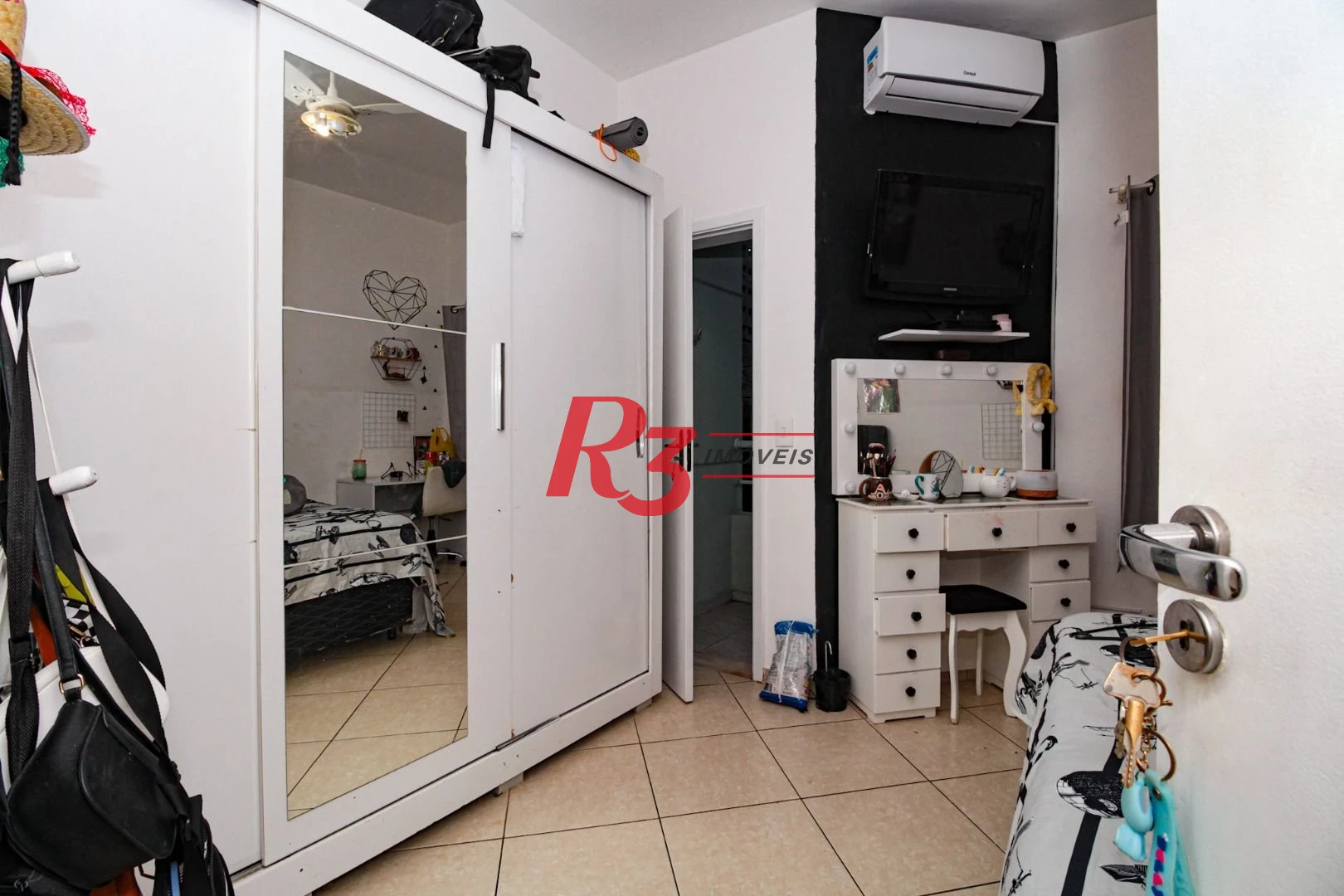 Sobrado com 3 dormitórios à venda, 89 m² por R$ 790.000,00 - Campo Grande - Santos/SP