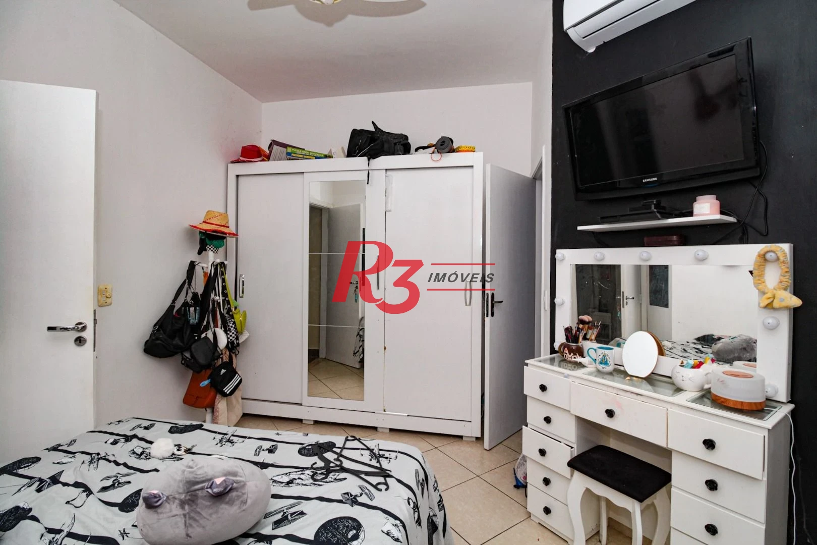 Sobrado com 3 dormitórios à venda, 89 m² por R$ 790.000,00 - Campo Grande - Santos/SP