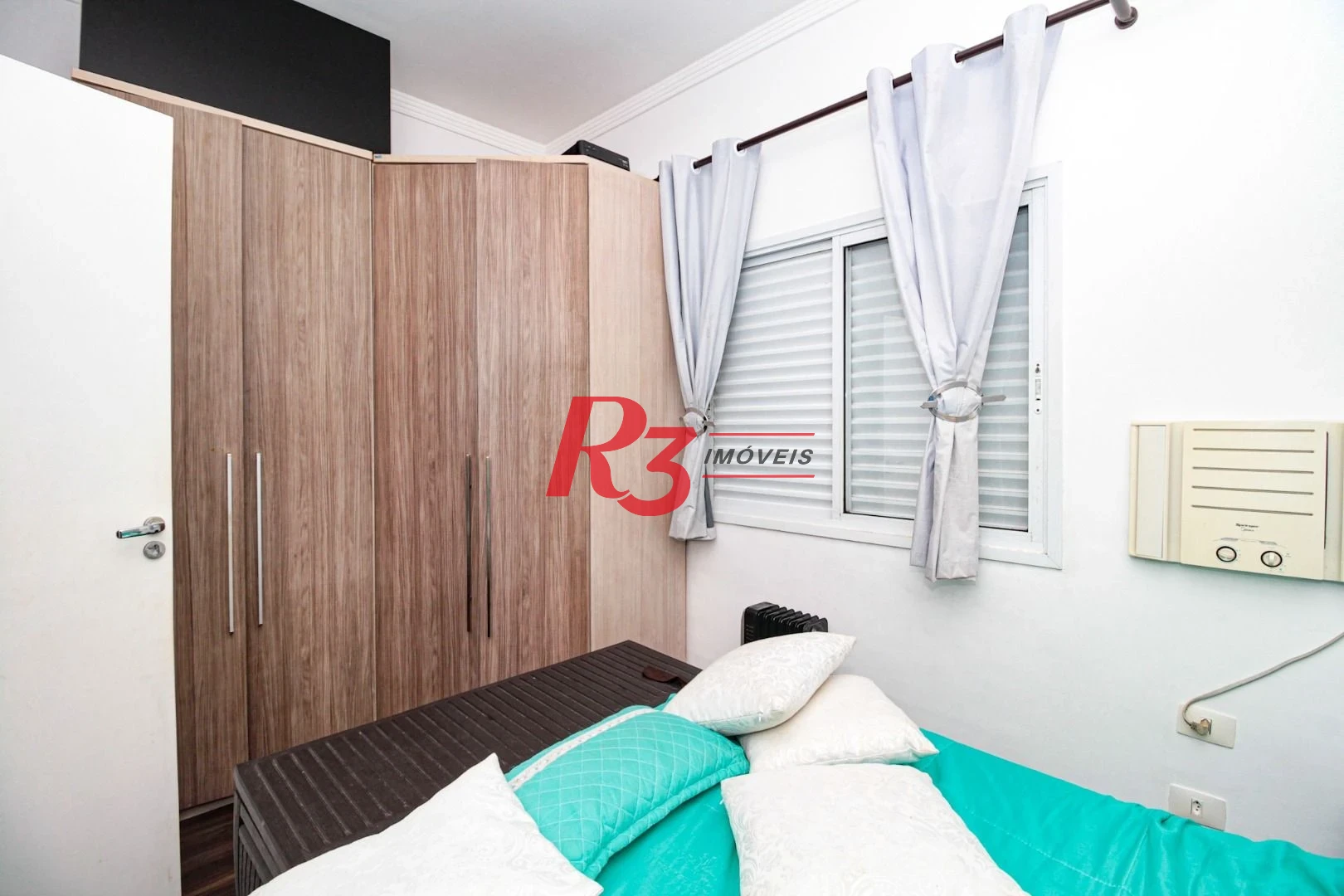 Sobrado com 3 dormitórios à venda, 89 m² por R$ 790.000,00 - Campo Grande - Santos/SP