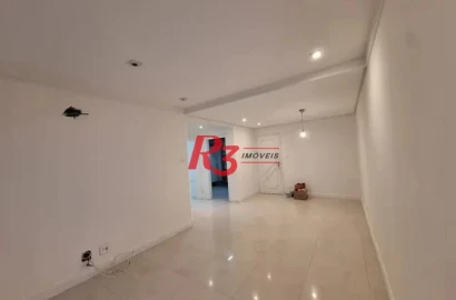 Amplo apartamento de 2 quartos à venda em frente à praia do Gonzaguinha.