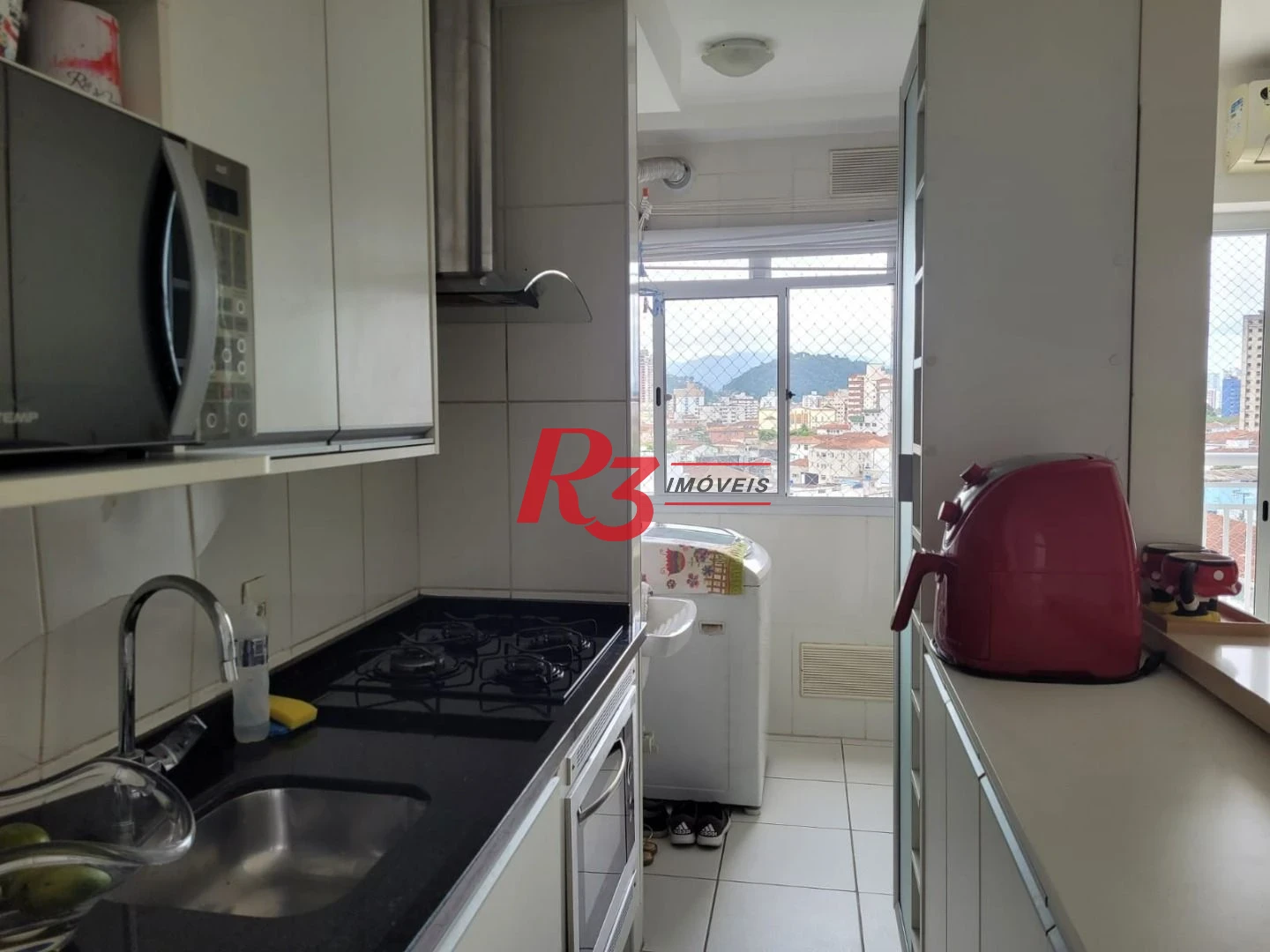 Apartamento com 2 dormitórios à venda, 64 m² por R$ 590.000,00 - Marapé - Santos/SP