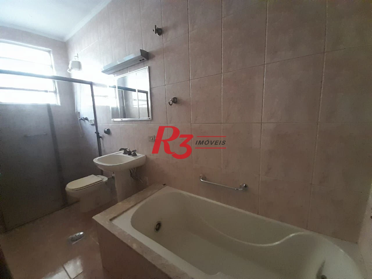 Casa à venda, 250 m² por R$ 1.600.000,00 - Gonzaga - Santos/SP