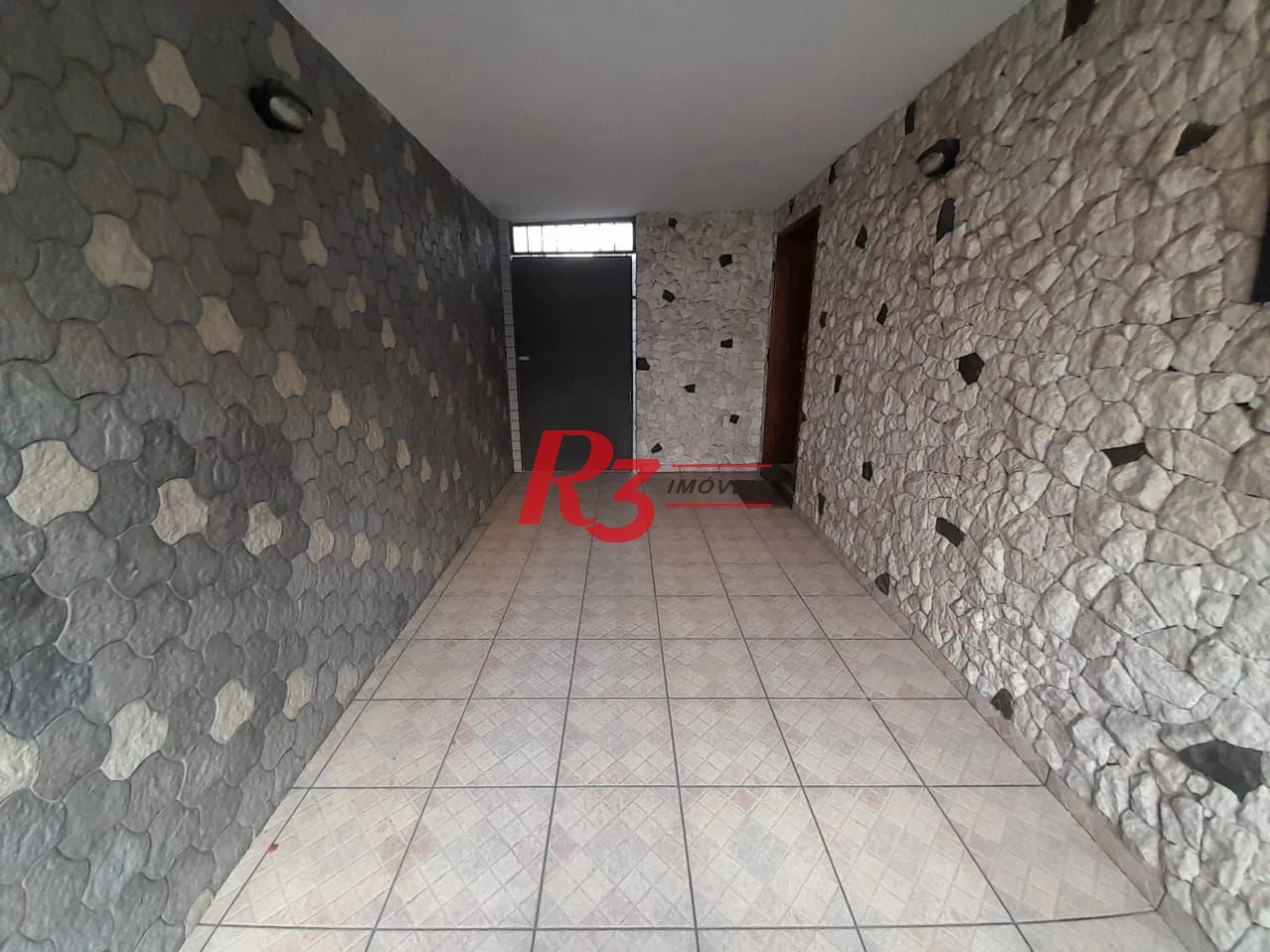 Casa à venda, 250 m² por R$ 1.600.000,00 - Gonzaga - Santos/SP