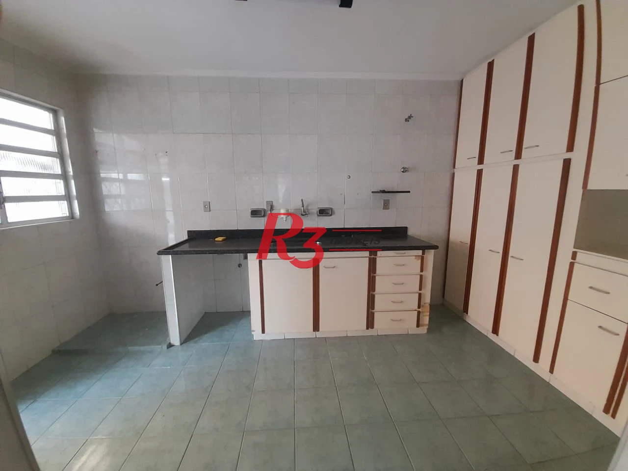 Casa à venda, 250 m² por R$ 1.600.000,00 - Gonzaga - Santos/SP