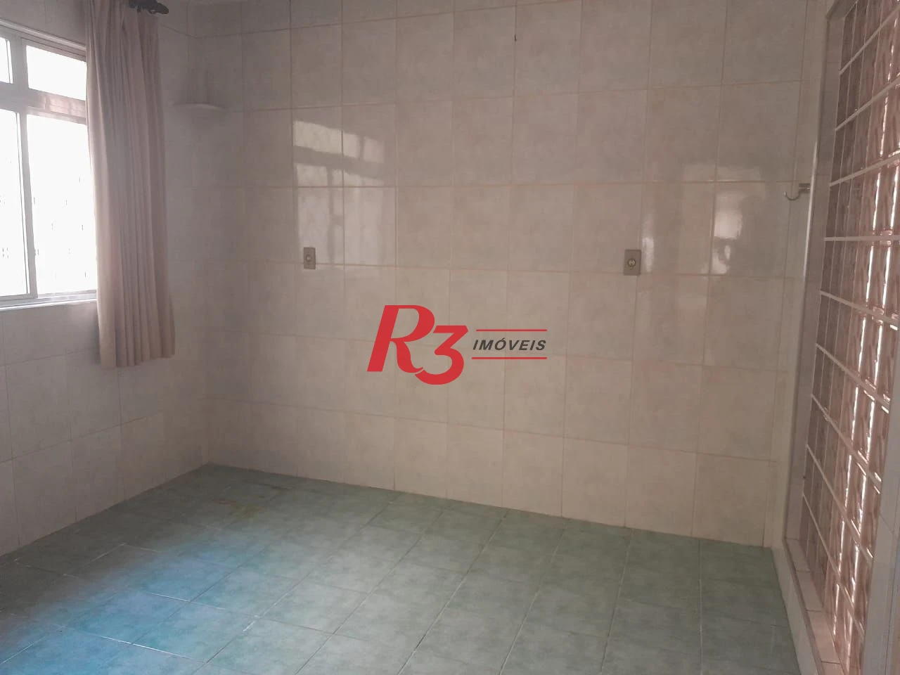 Casa à venda, 250 m² por R$ 1.600.000,00 - Gonzaga - Santos/SP