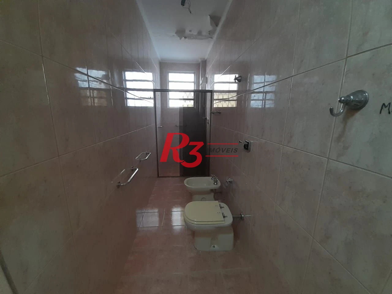 Casa à venda, 250 m² por R$ 1.600.000,00 - Gonzaga - Santos/SP