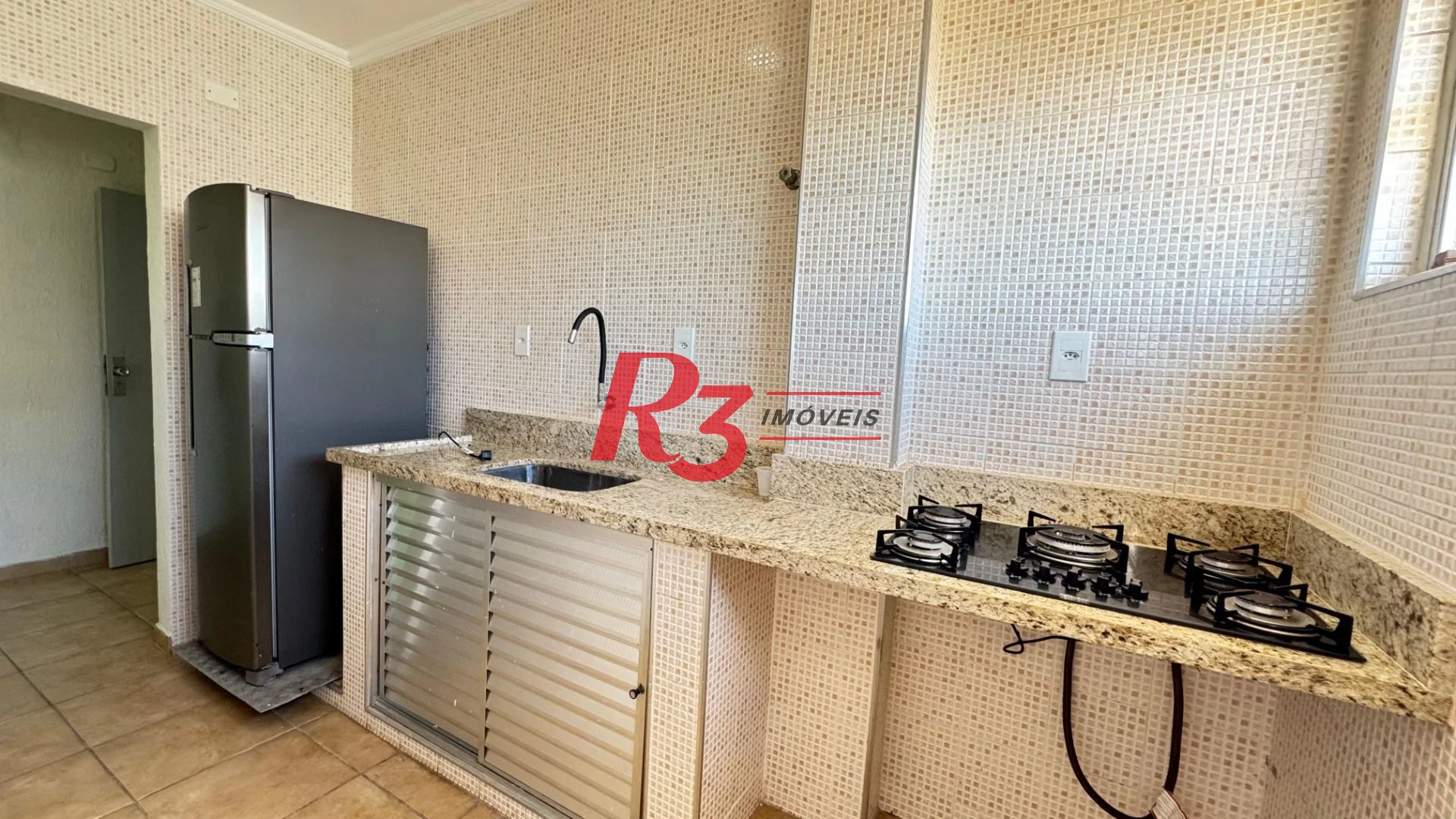 Apartamento com 2 dormitórios à venda, 55 m² por R$ 535.000,00 - Gonzaga - Santos/SP