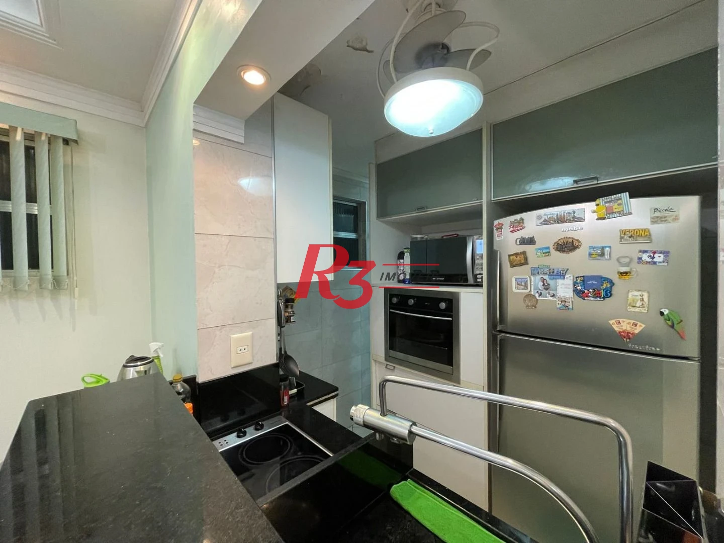 Apartamento com 2 dormitórios à venda, 55 m² por R$ 535.000,00 - Gonzaga - Santos/SP
