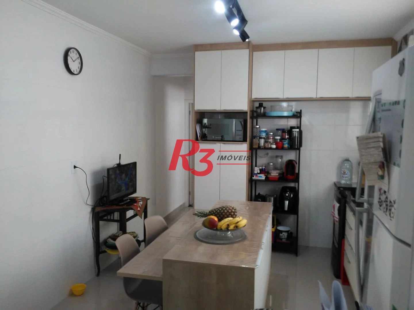Casa à venda, 128 m² por R$ 775.000,00 - Ponta da Praia - Santos/SP