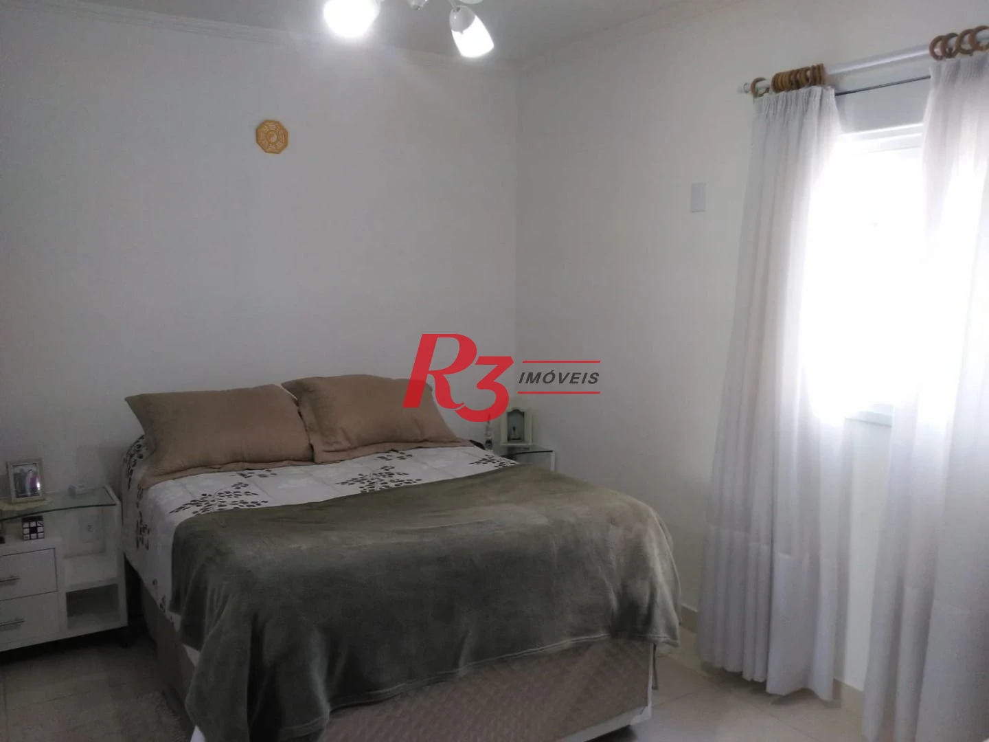 Casa à venda, 128 m² por R$ 775.000,00 - Ponta da Praia - Santos/SP
