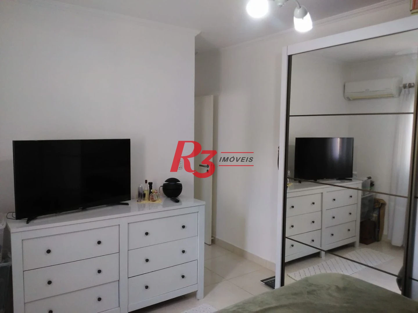 Casa à venda, 128 m² por R$ 775.000,00 - Ponta da Praia - Santos/SP