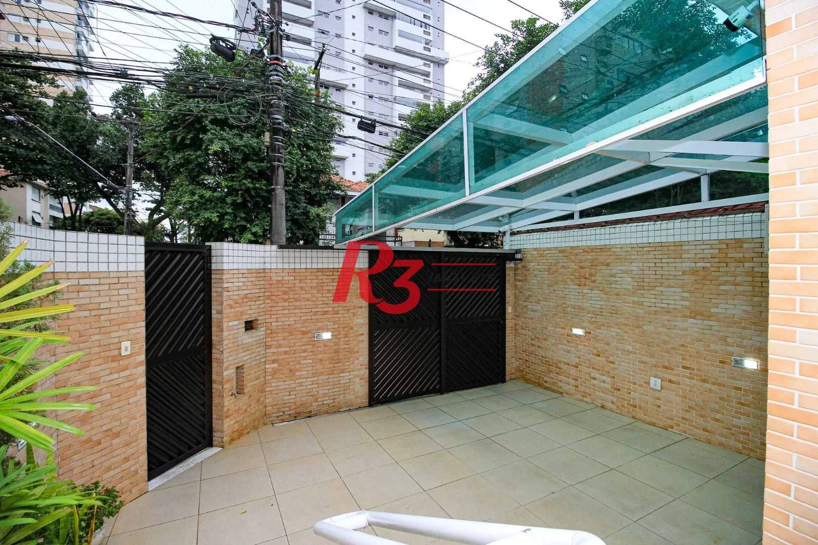 Sobrado com 4 dormitórios à venda, 150 m² por R$ 2.000.000,00 - Gonzaga - Santos/SP