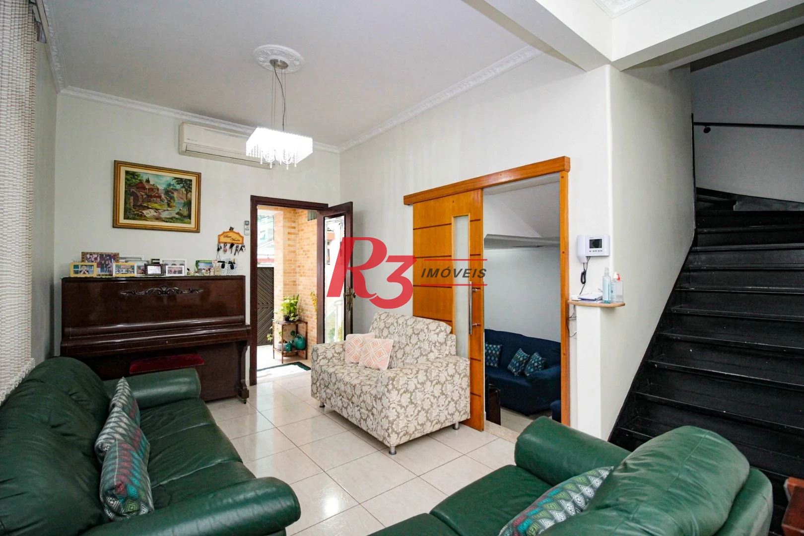 Sobrado com 4 dormitórios à venda, 150 m² por R$ 2.000.000,00 - Gonzaga - Santos/SP