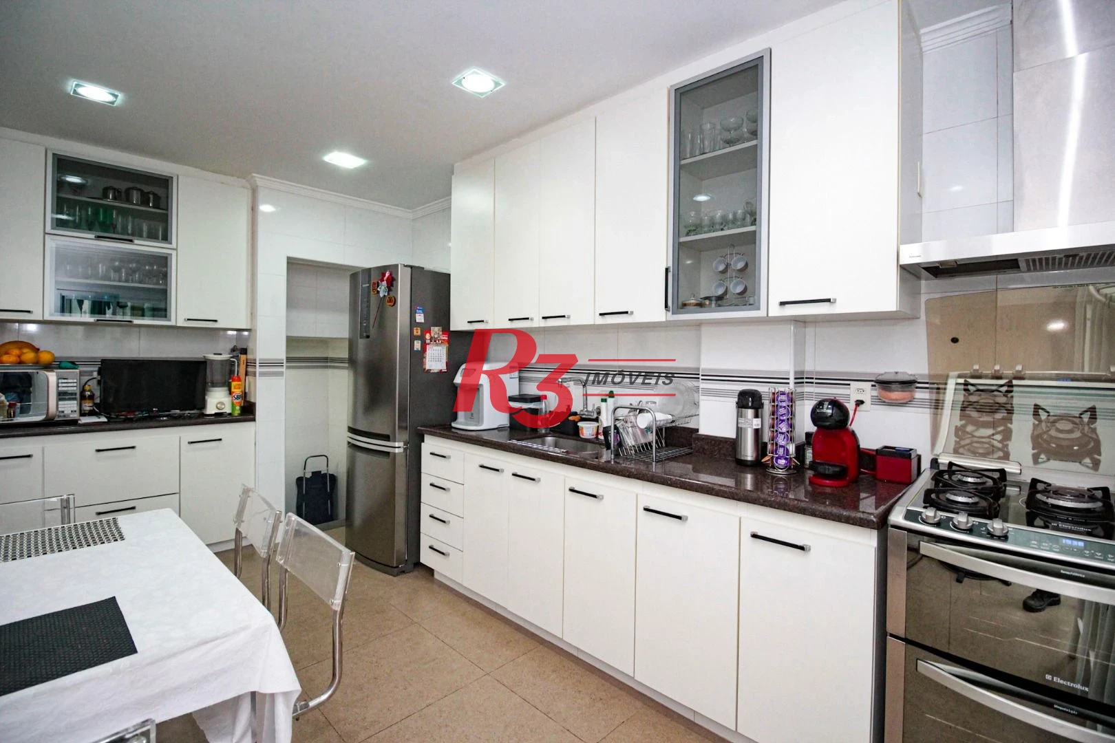 Sobrado com 4 dormitórios à venda, 150 m² por R$ 2.000.000,00 - Gonzaga - Santos/SP