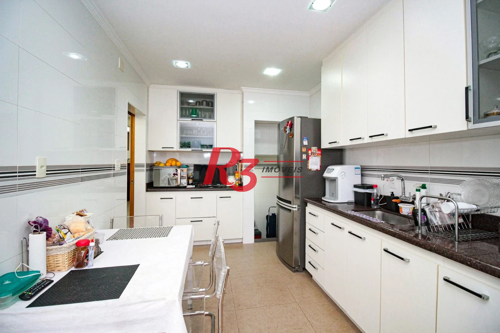 Sobrado com 4 dormitórios à venda, 150 m² por R$ 2.000.000,00 - Gonzaga - Santos/SP