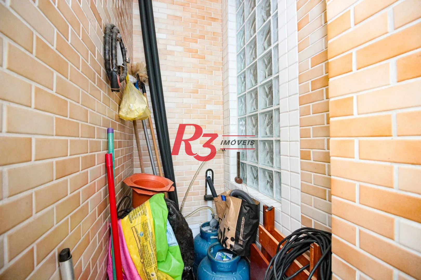 Sobrado com 4 dormitórios à venda, 150 m² por R$ 2.000.000,00 - Gonzaga - Santos/SP