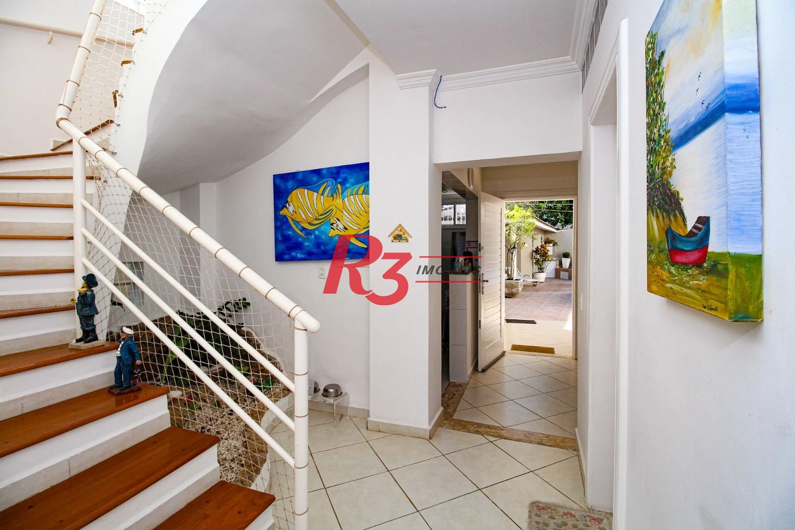 Sobrado à venda, 340 m² por R$ 3.200.000,00 - Loteamento João Batista Julião - Guarujá/SP