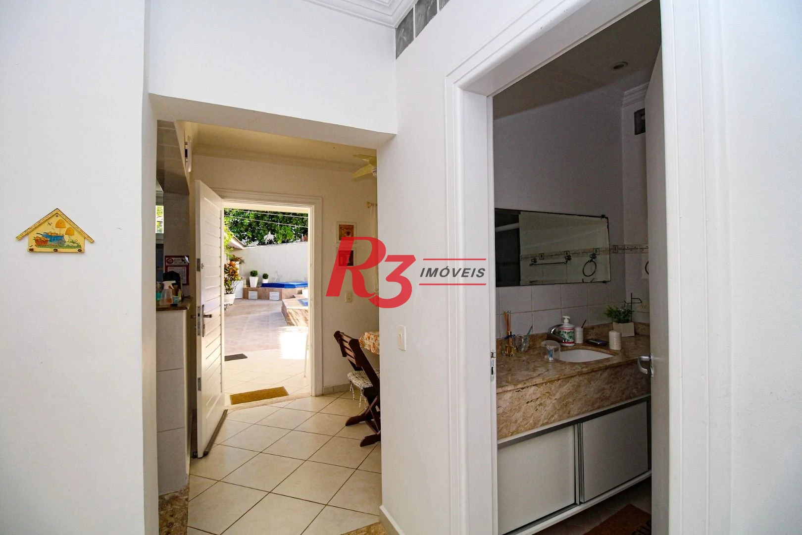 Sobrado à venda, 340 m² por R$ 3.200.000,00 - Loteamento João Batista Julião - Guarujá/SP