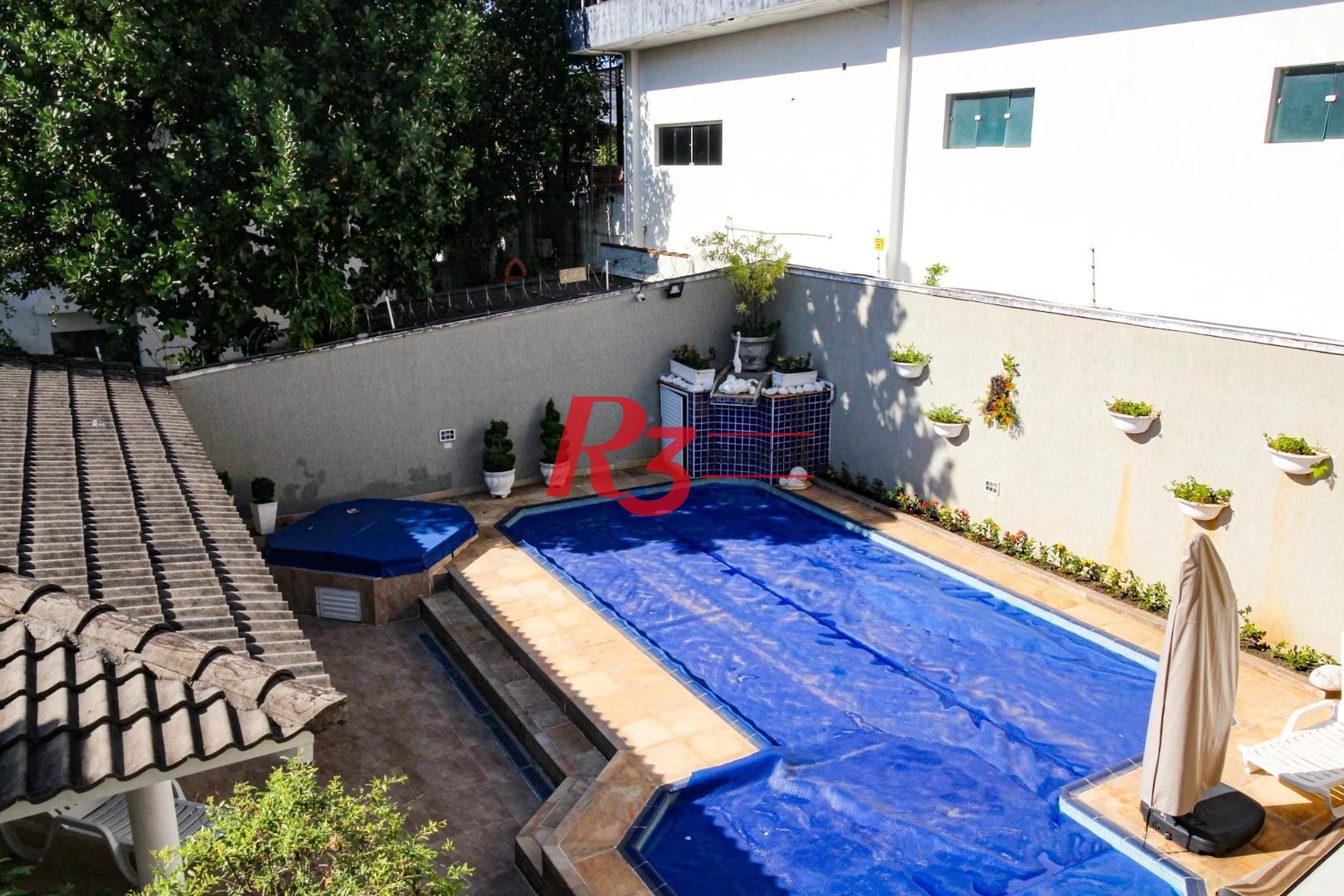 Sobrado à venda, 340 m² por R$ 3.200.000,00 - Loteamento João Batista Julião - Guarujá/SP