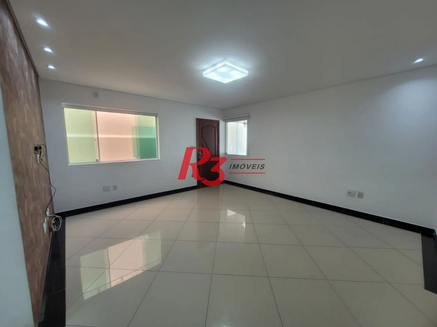 Casa com 3 dormitórios à venda, 160 m² por R$ 1.000.000,00 - Estuário - Santos/SP