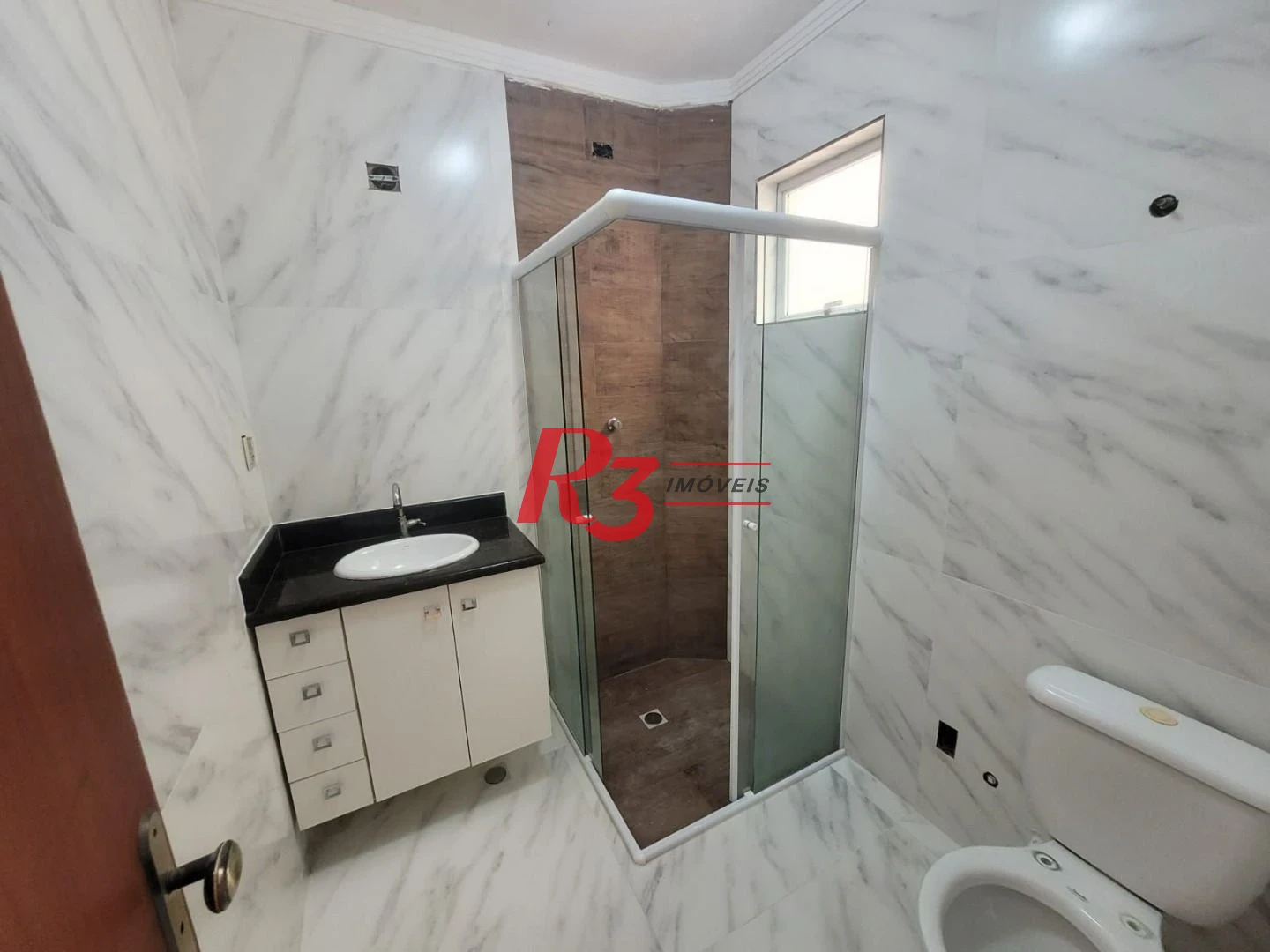 Casa com 3 dormitórios à venda, 160 m² por R$ 1.000.000,00 - Estuário - Santos/SP