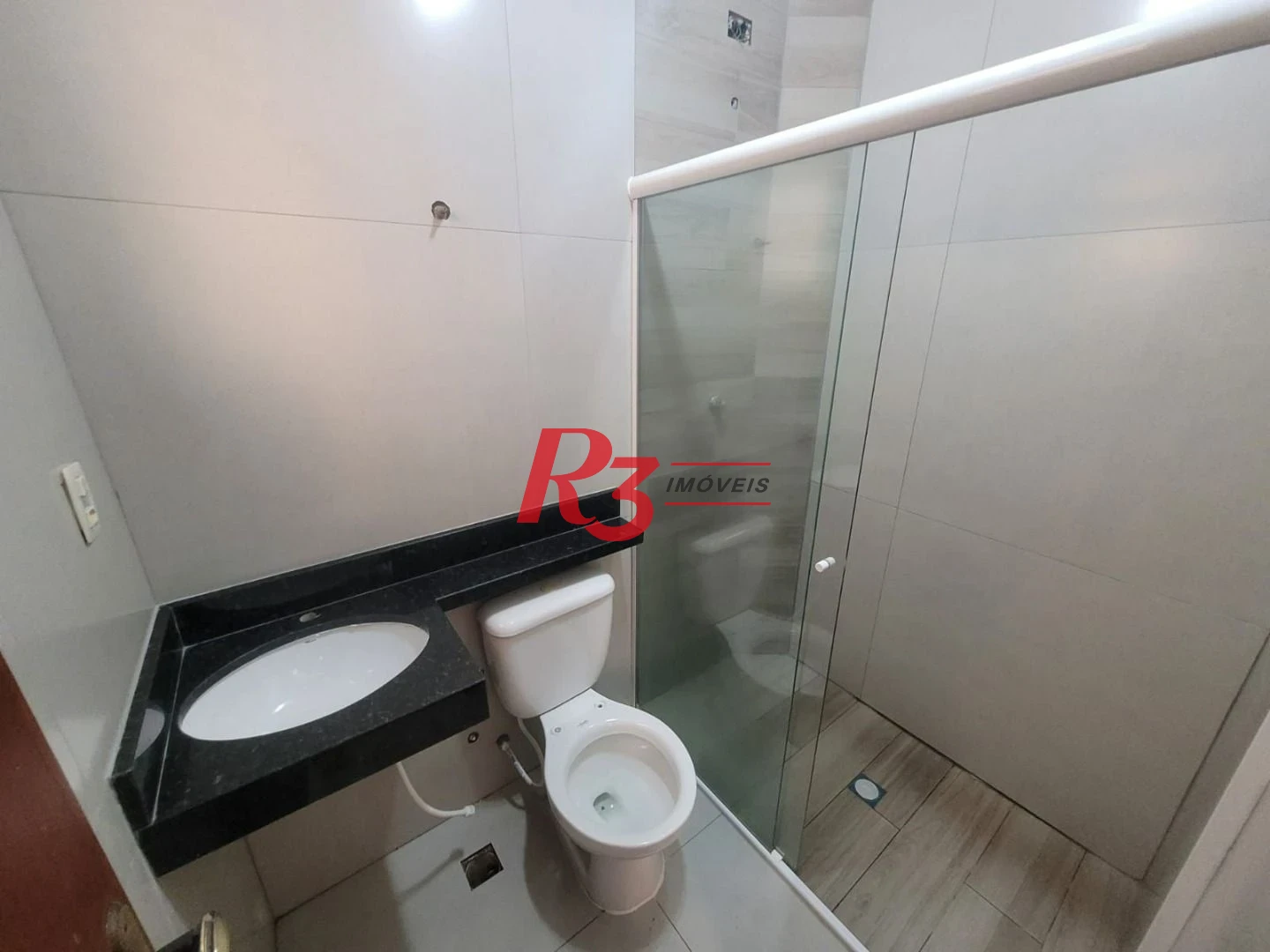 Casa com 3 dormitórios à venda, 160 m² por R$ 1.000.000,00 - Estuário - Santos/SP