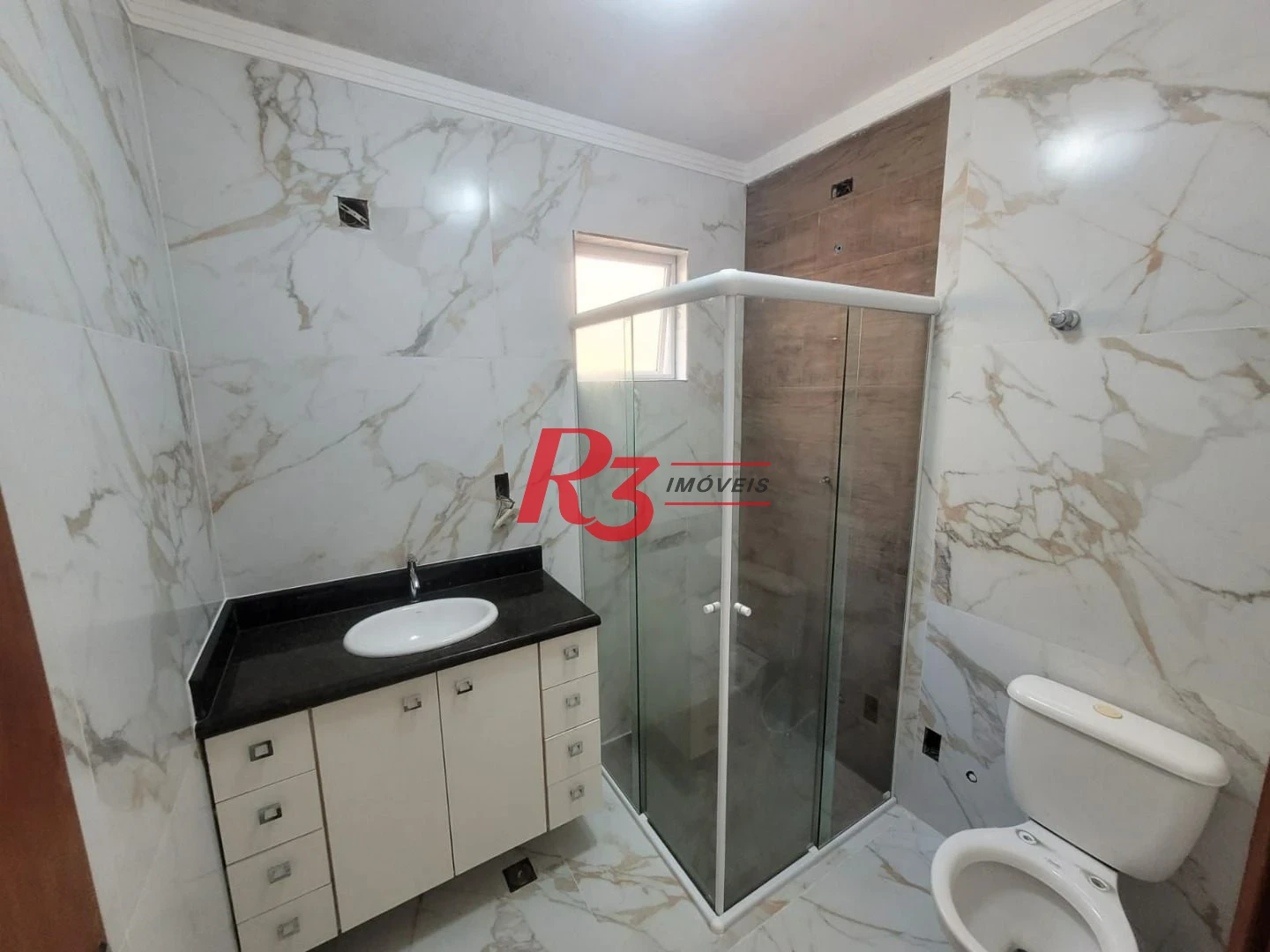 Casa com 3 dormitórios à venda, 160 m² por R$ 1.000.000,00 - Estuário - Santos/SP