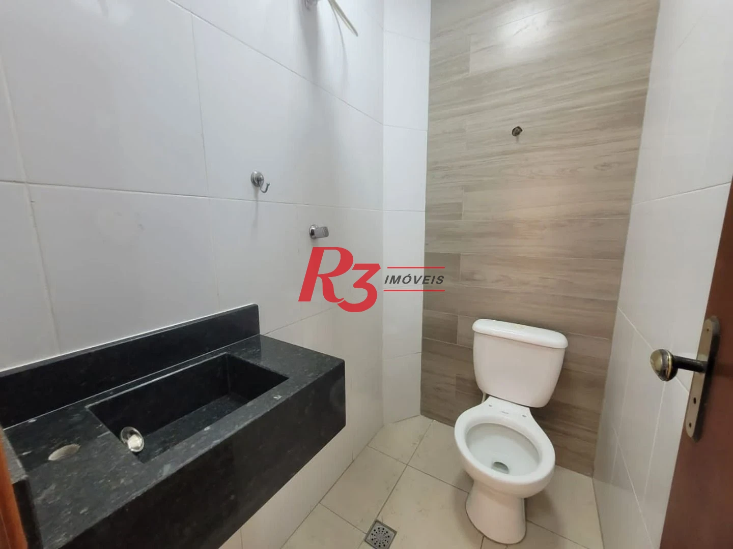 Casa com 3 dormitórios à venda, 160 m² por R$ 1.000.000,00 - Estuário - Santos/SP