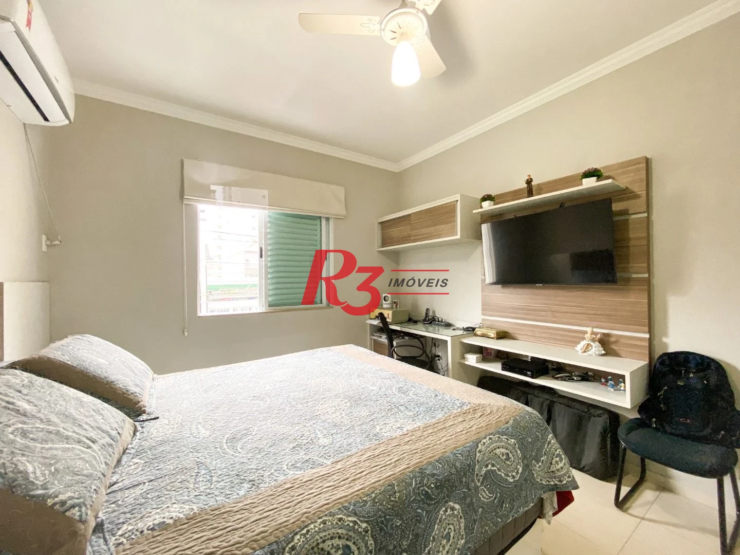 Sobrado com 3 dormitórios à venda, 130 m² por R$ 980.000 no José Menino - Santos/SP