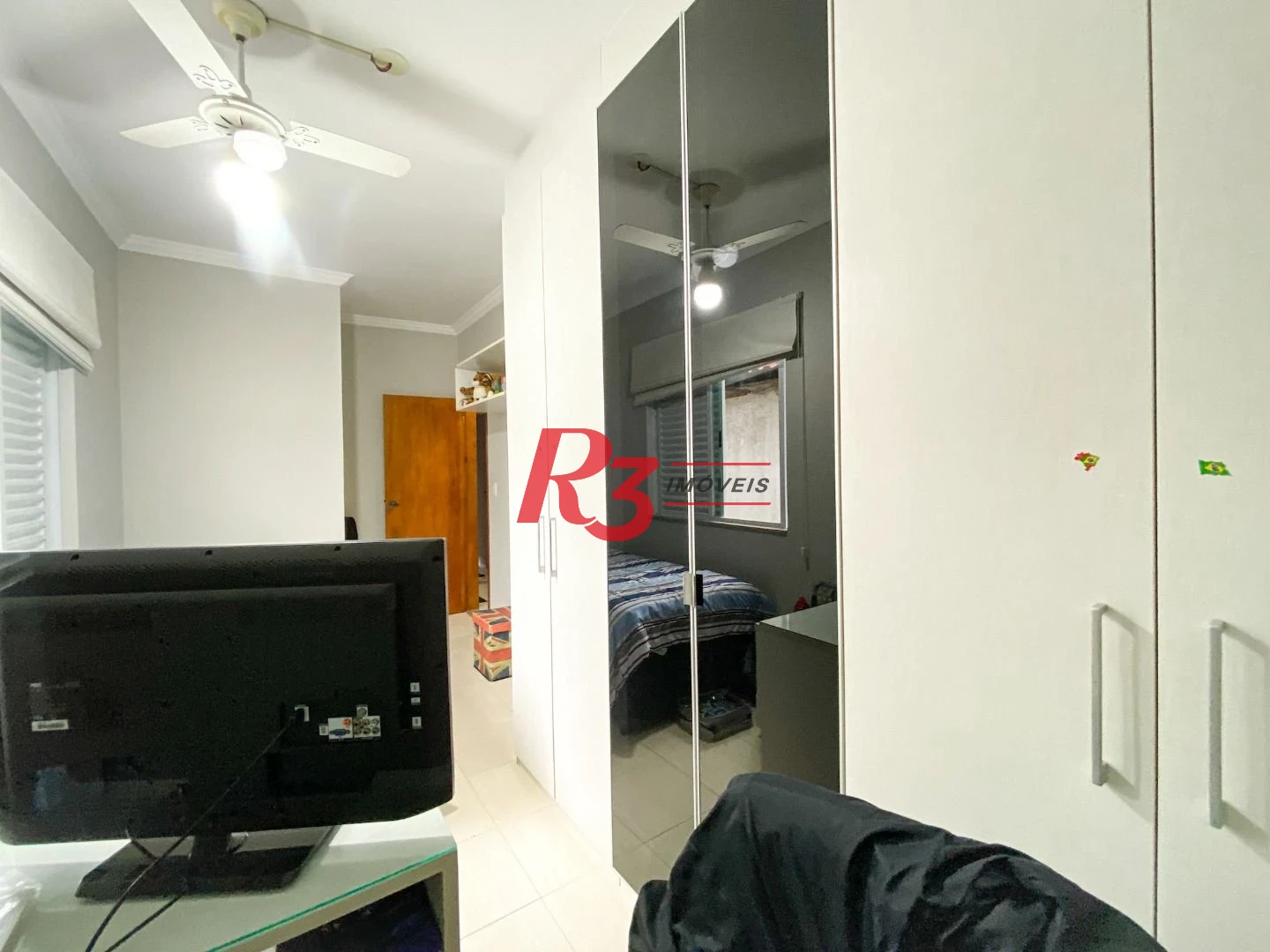 Sobrado com 3 dormitórios à venda, 130 m² por R$ 980.000 no José Menino - Santos/SP