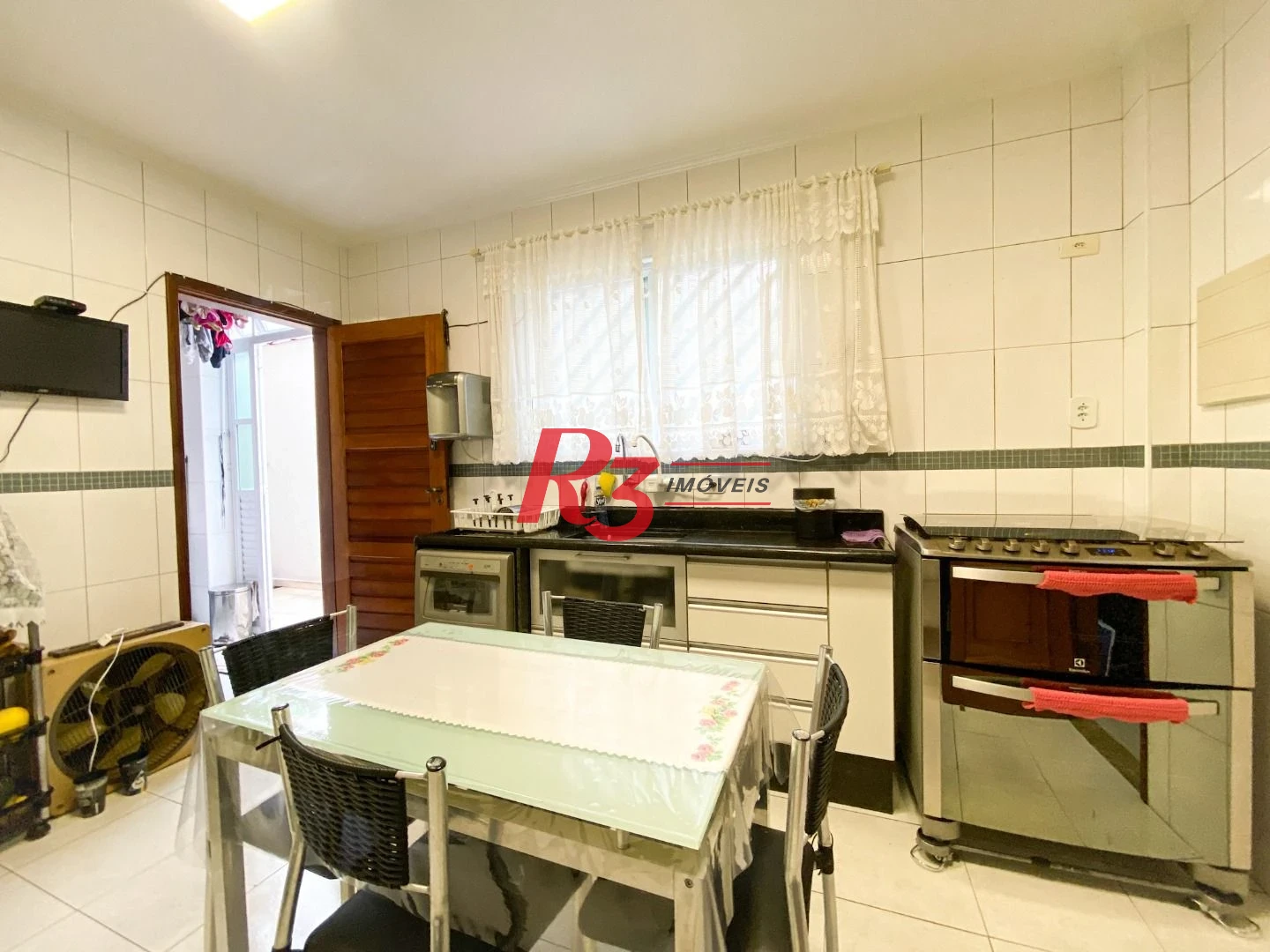 Sobrado com 3 dormitórios à venda, 130 m² por R$ 980.000 no José Menino - Santos/SP