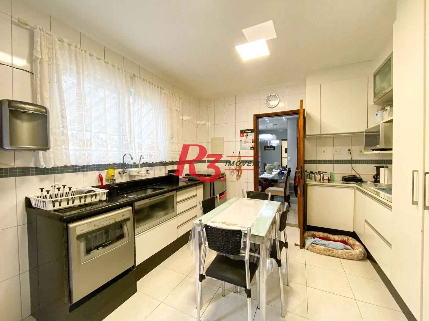 Sobrado com 3 dormitórios à venda, 130 m² por R$ 980.000 no José Menino - Santos/SP