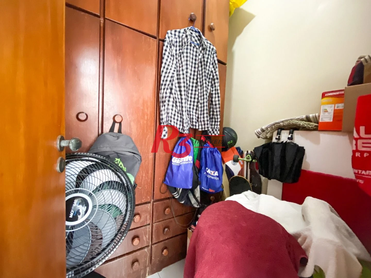 Sobrado com 3 dormitórios à venda, 130 m² por R$ 980.000 no José Menino - Santos/SP